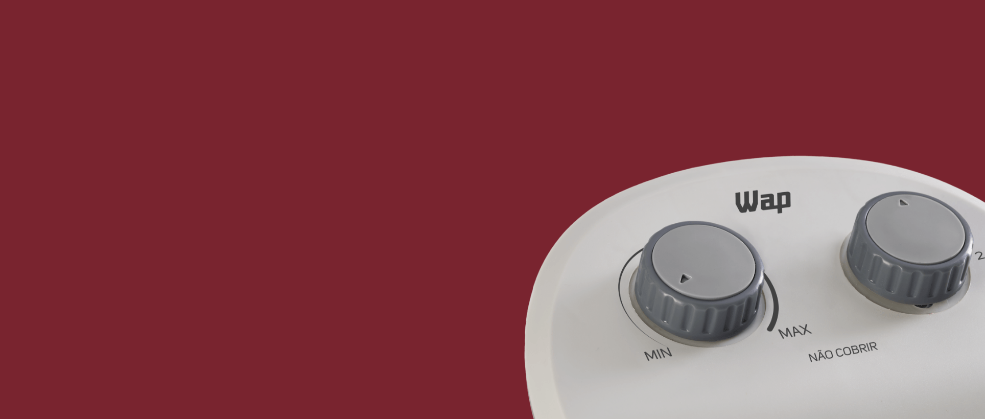 Aquecedor Air Heat visão frontal do equipamento, pois grades parte inferior, em cima da grade possui uma luz indicadora de funcionamento e na parte superior dois botões giratórios um para controle de temperatura